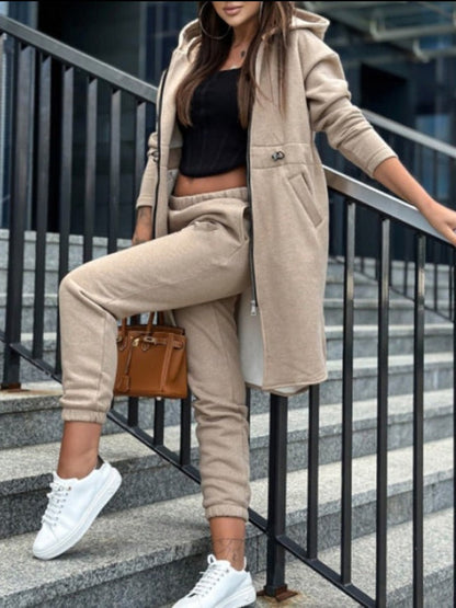 Two-piece set consisting of a plain coat and trousers